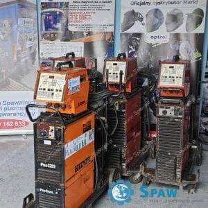 ? Kemppi PRO 3000 TIG welder with Protig 410 attachment and TX panel on a uniform background, showing modern design and control panel.